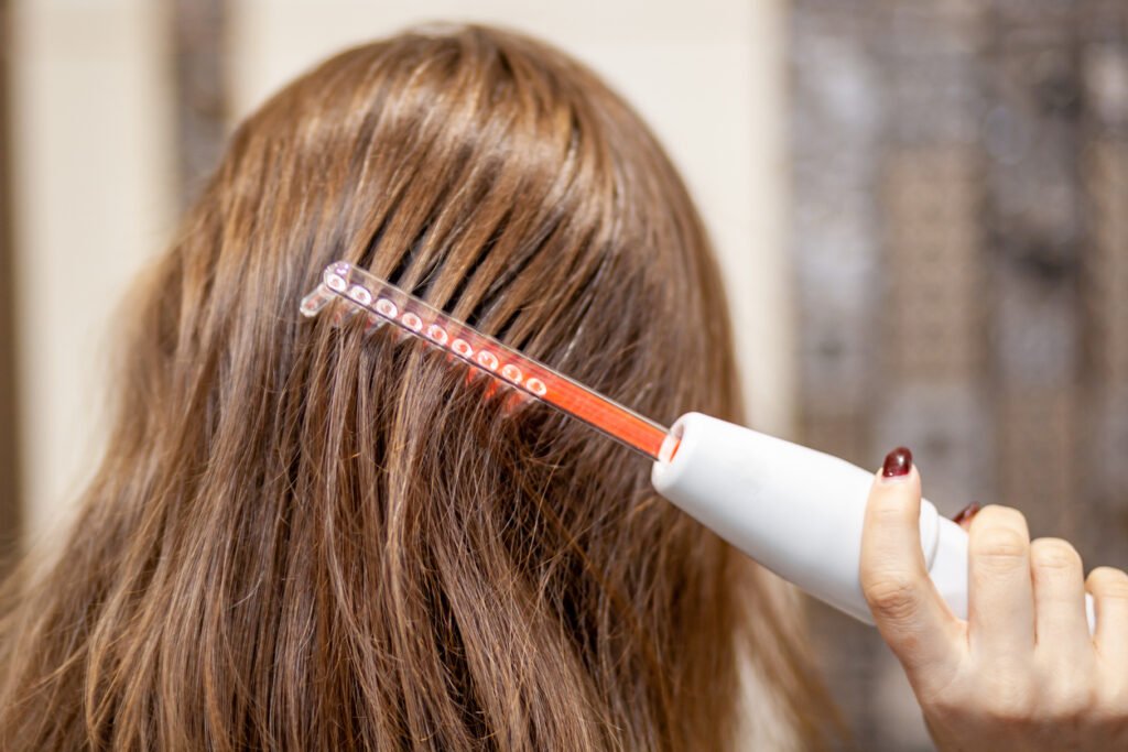 HOME woman uses darsonval for massage head